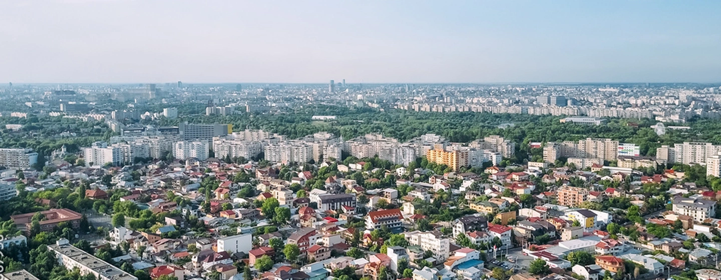 Wide aerial shot of cityscape.